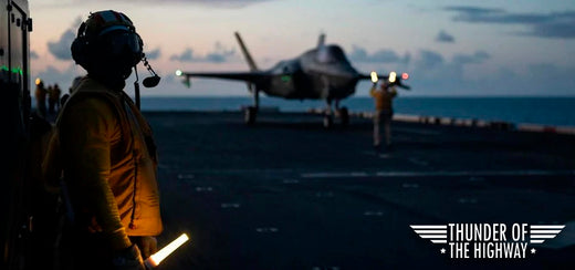 Plane taking off on a carrier