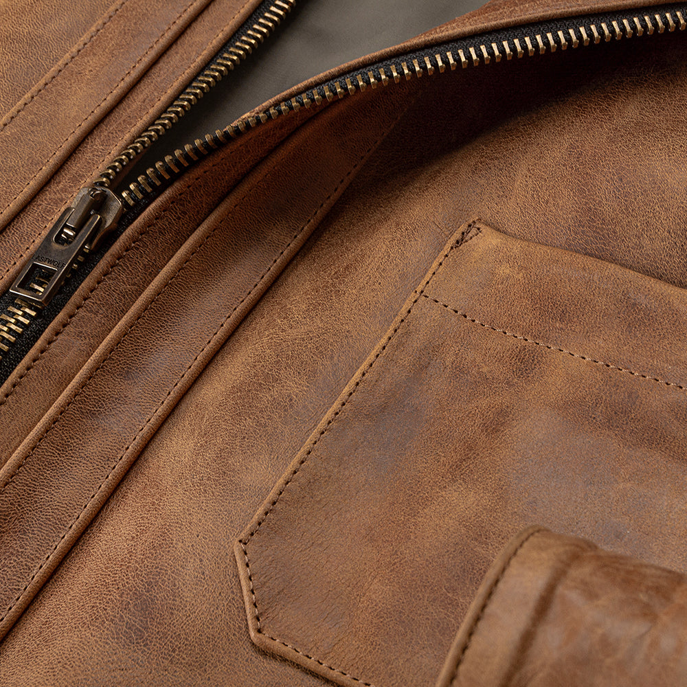 Leather and construction details on a Last Wolf work jacket