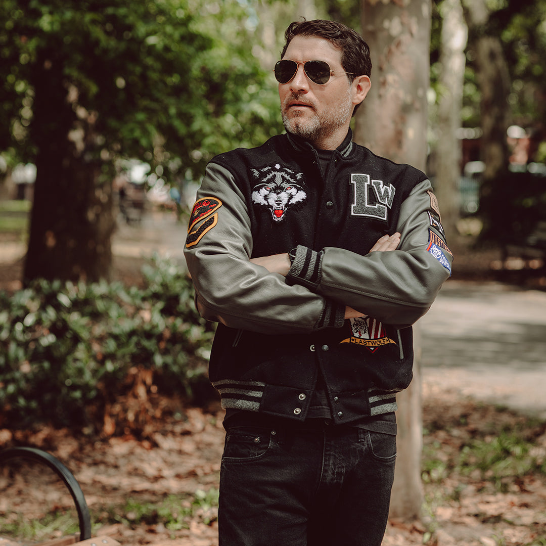 MIGHTY WOLVES VARSITY JACKET - BLACK