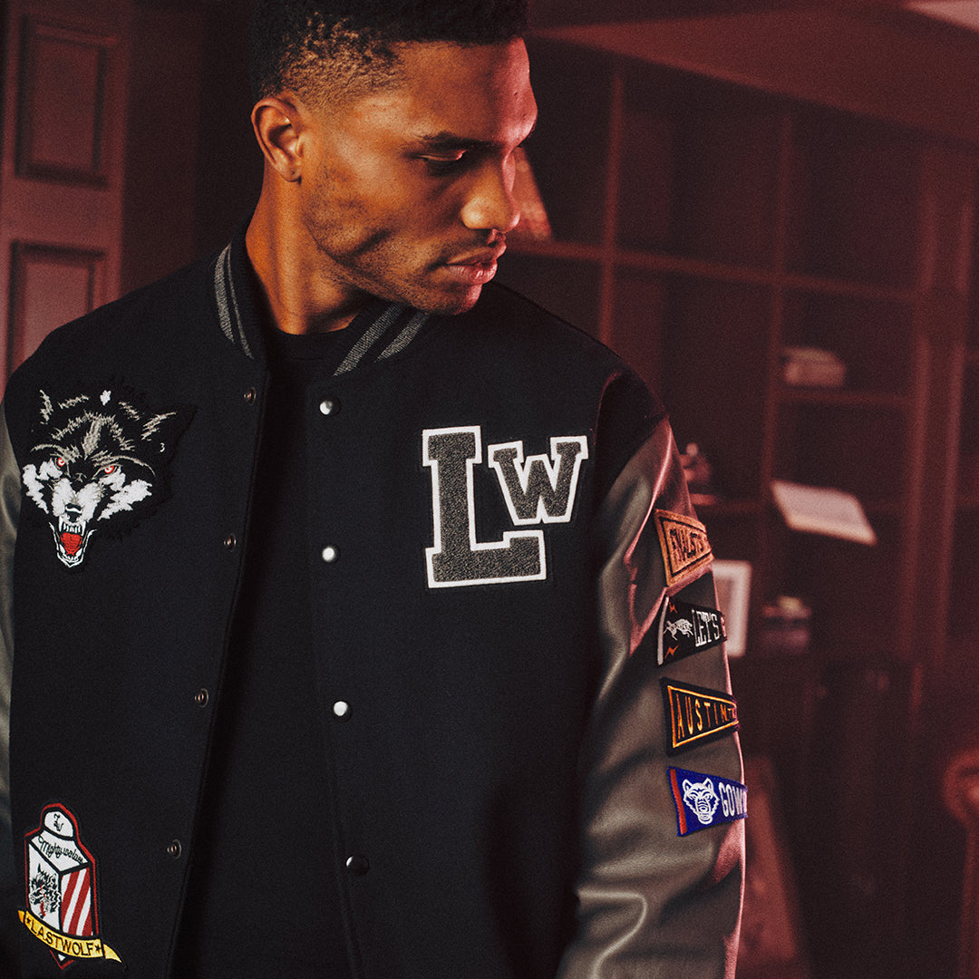 MIGHTY WOLVES VARSITY JACKET - BLACK