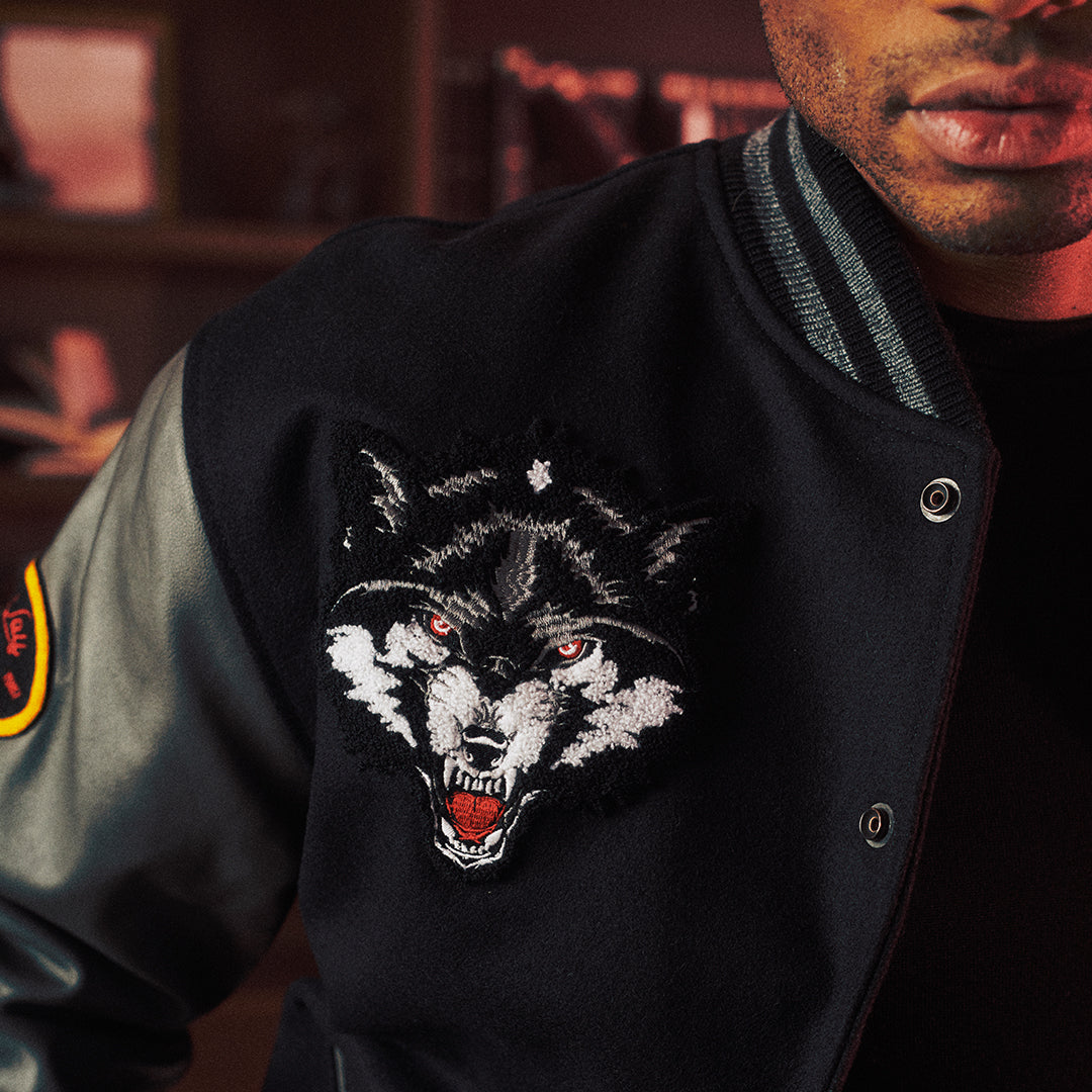 MIGHTY WOLVES VARSITY JACKET - BLACK